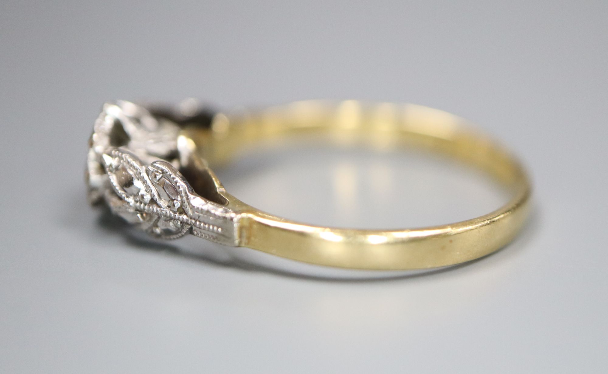 A 1960's 18ct gold and plat, illusion set solitaire diamond ring, size L, gross 2.3 grams.CONDITION: - Image 2 of 4