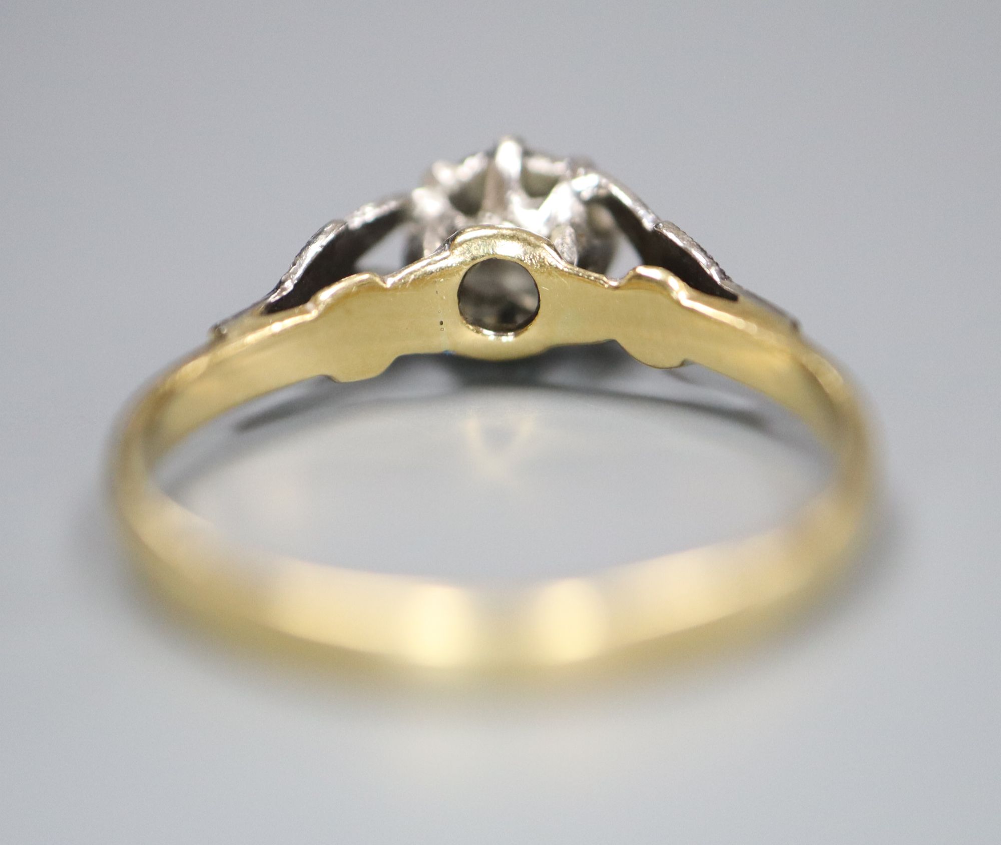 A 1960's 18ct gold and plat, illusion set solitaire diamond ring, size L, gross 2.3 grams.CONDITION: - Image 4 of 4