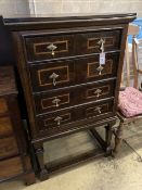 An 18th century style linenfold moulded oak and walnut chest on stand, width 73cm, depth 55cm,