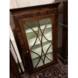 A George III mahogany hanging corner cupboard with glazed door, width 74cm, depth 39cm, height