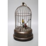 A double automaton bird cage, 28cmCONDITION: Integral key working - motion works and sounds