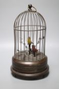 A double automaton bird cage, 28cmCONDITION: Integral key working - motion works and sounds