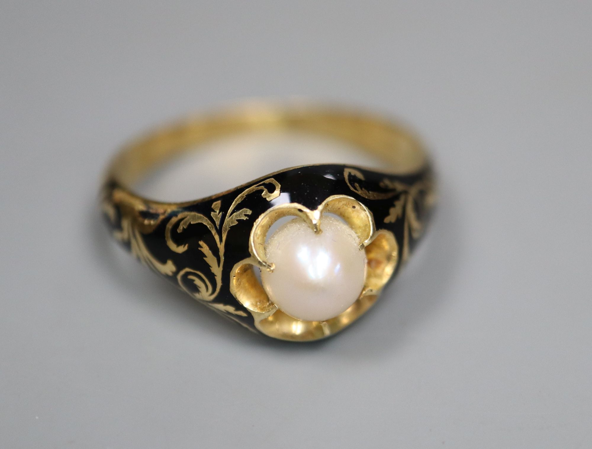 A Victorian 18ct gold, black enamel and pearl memorial ring, gross 3.7 grams