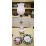 An ormolu mounted bone china oil lamp, height overall 80cm, an ironstone dessert dish and other