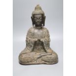 A large bronze seated figure of Buddha, height 44cmCONDITION: Sight of underside and casting