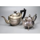 A George V silver London shape teapot and an earlier small circular form teapot with shaped rim,