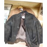 A light tan 1960's suede jacket and a similar chocolate brown jacket