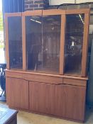 Skovby, Denmark, a teak cabinet fitted plate glass doors over three drawers and three cupboards,