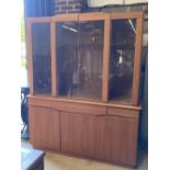 Skovby, Denmark, a teak cabinet fitted plate glass doors over three drawers and three cupboards,