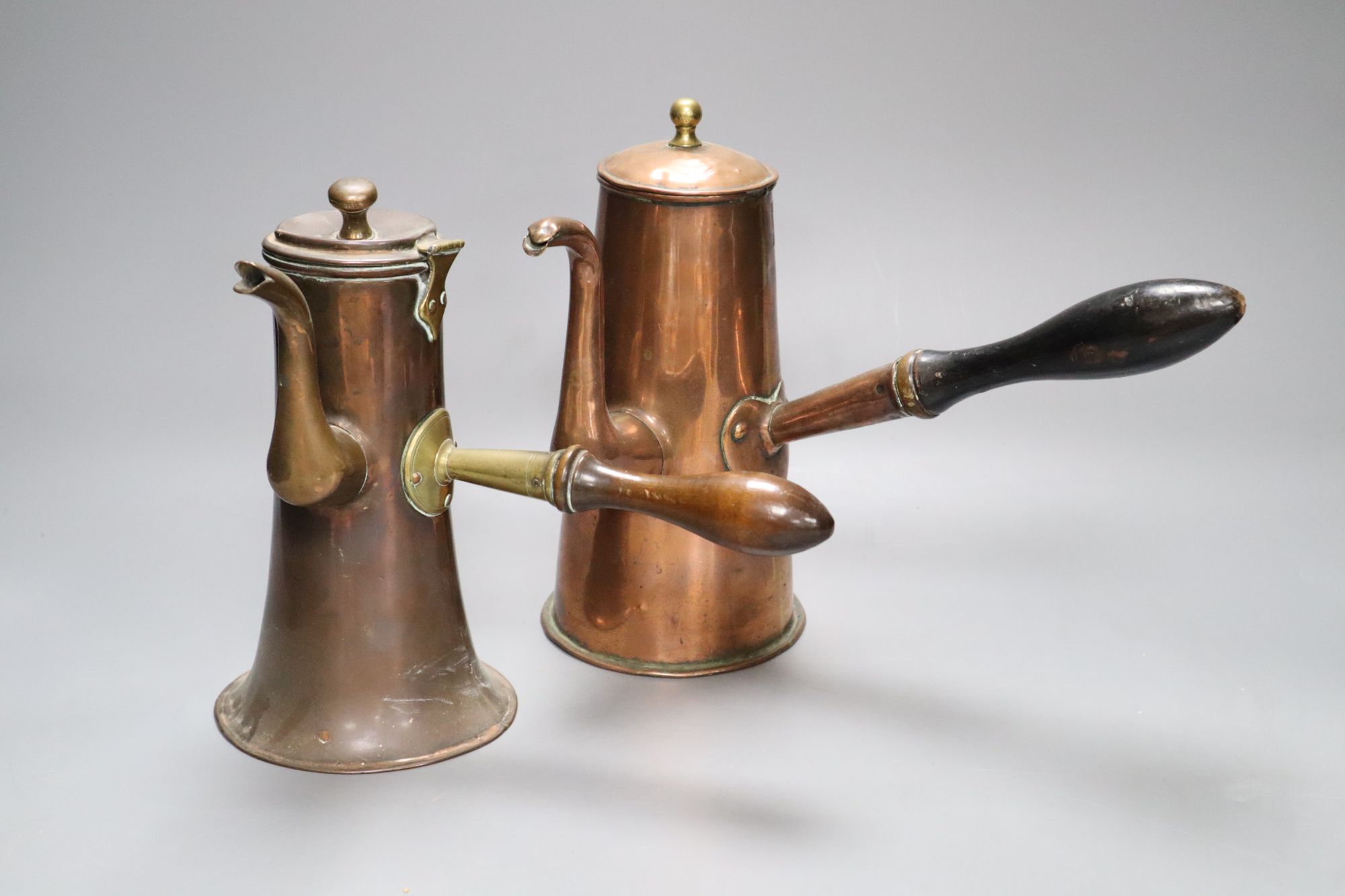 Two 18th century copper Tavern coffee pots, tallest 20cmCONDITION: Smaller pot - hinged cover