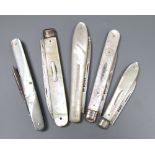 Four assorted Victorian and later silver and mother of pearl fruit knives, one handle cracked and