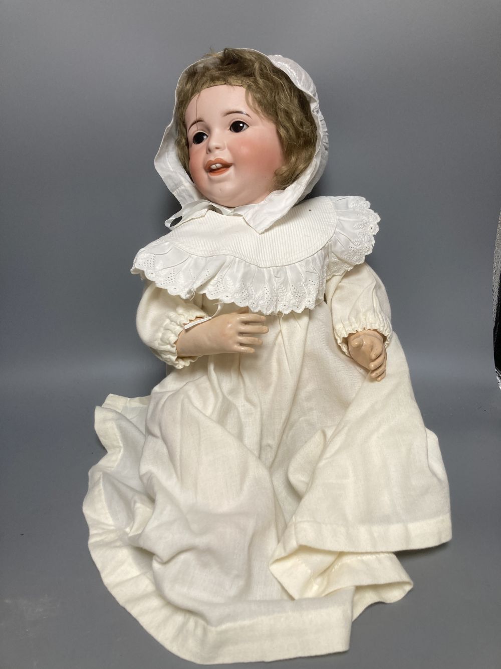 A French SFBJ bisque-headed doll, mould 236 with sleeping eyes and closed mouth, bent-limb