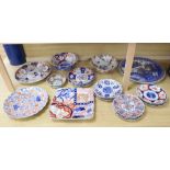 A collection of Japanese Imari dishes, bowls and a large square dishCONDITION: One large Imari