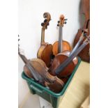 A group of five early 20th century violins