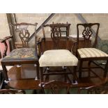 Two George III mahogany elbow chairs and a single chair