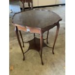 A late Victorian mahogany shaped circular topped two tier table, 67cm diameter, 72cm high