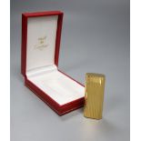 A cased Must de Cartier gold plated lighter