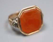 A Georgian yellow and white metal, octagonal carnelian and rose cut diamond set ring, size R/S,