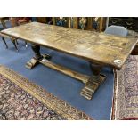 An oak refectory table on turned end supports, width 222cm depth 84cm height 77cm