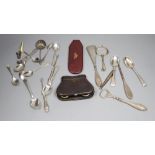 A group of silver spoons and implements, together with a pair of folding opera glasses