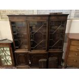 A reproduction George III-style mahogany breakfront library bookcase, width 172cm, depth 40cm,