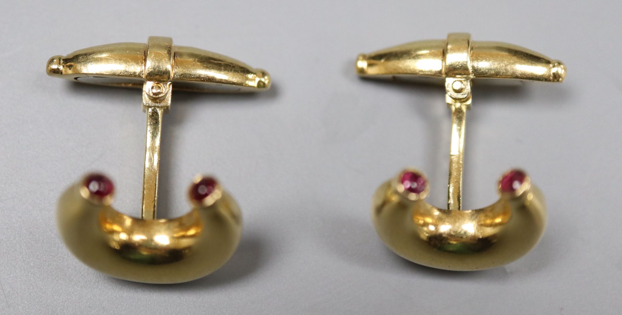 A pair of modern 18ct gold and ruby set horseshoe shaped cufflinks by Mappin & Webb, London, 1989, - Image 3 of 4