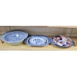 A Chinese blue and white bowl, three Chinese blue and white plates and an Imari plate, largest