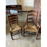 A set of eight rush seat ladderback dining chairs (two with arms)