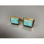 A pair of yellow metal and turquoise set rectangular cufflinks, 20mm, gross 15.8 grams.CONDITION: