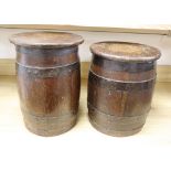 Two coopered oak sherry barrels (converted as small tables), height 39cm