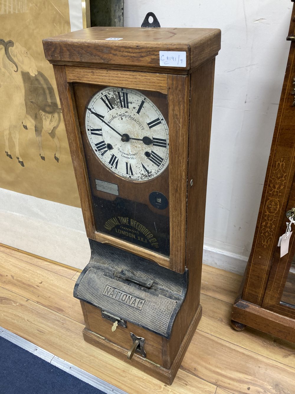 An early 20th century National Time Recording clock, width 33cm depth 28cm height 97cmCONDITION: