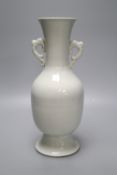 A Chinese white glazed porcelain two handled vase, height 29cm (a.f.)CONDITION: Base section has