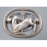 A 1960's Georg Jensen silver kneeling deer oval brooch, no. 256, designed by Arno Malinowski, 45mm.