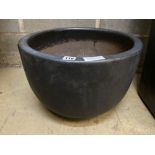 A circular grey glazed garden planter, width 46cm, height 29cm