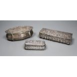 A Victorian silver rectangular box embossed with medieval hunting scenes, 15.3cm and two other