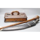 A kukri, an oak inkstand and a tribal throwing club