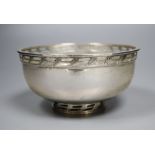 A modern silver circular bowl, with pieced border and foot, Albert Edward Jones Ltd, Birmingham,