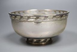 A modern silver circular bowl, with pieced border and foot, Albert Edward Jones Ltd, Birmingham,