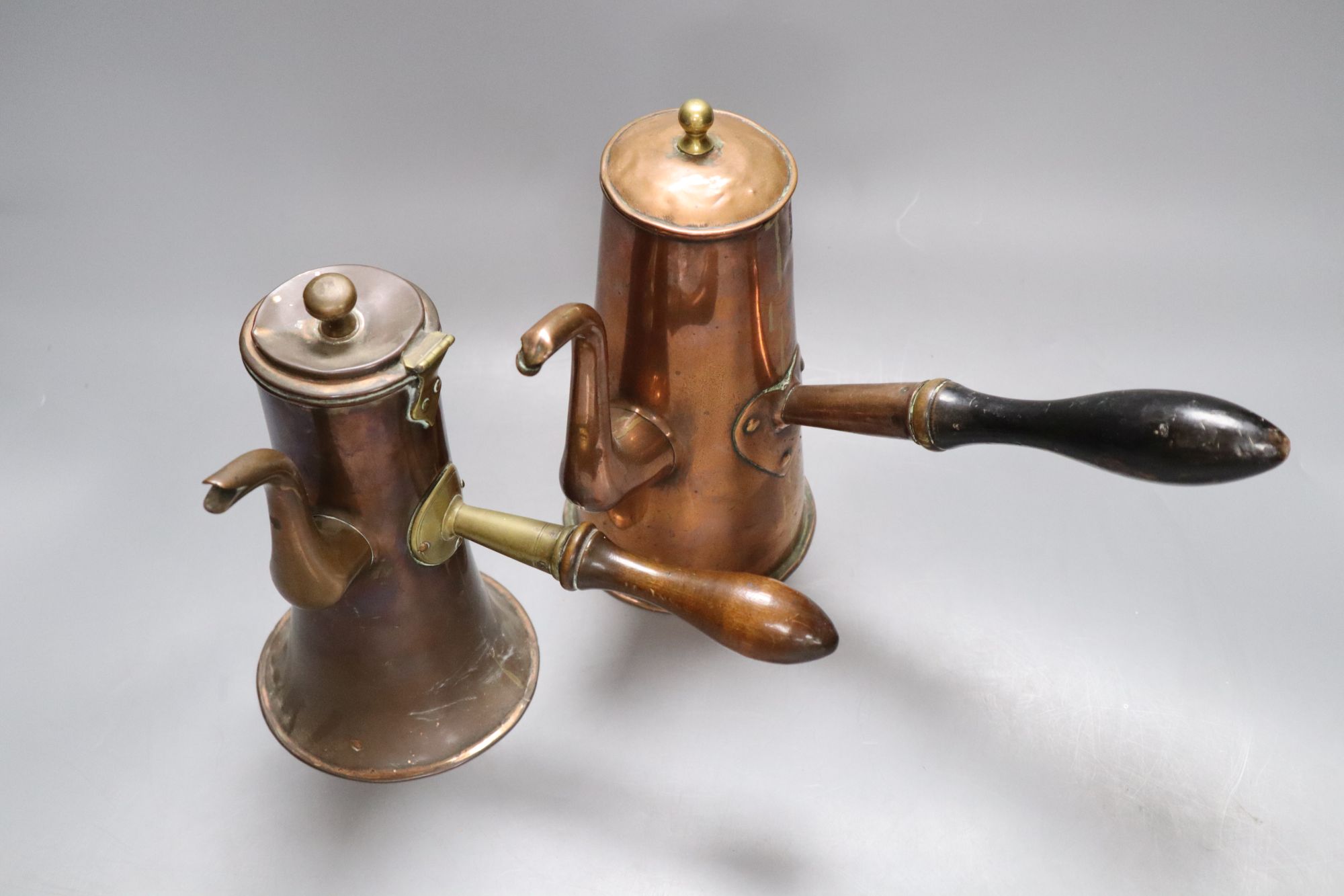 Two 18th century copper Tavern coffee pots, tallest 20cmCONDITION: Smaller pot - hinged cover - Image 2 of 3