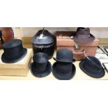 A solar pith helmet in japanned metal case, a military cap, a leather dressing case and seven