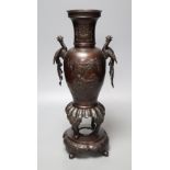 A 19th century Japanese Meiji period bronze censer vase, the handles formed as phoenix, height 41cm