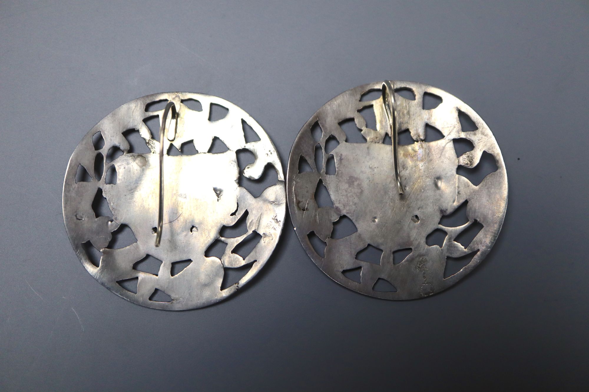 A pair of continental pierced white metal foliate and mask concave circular earrings, 38mm, gross - Image 2 of 2