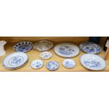 A collection of mostly 18th century Chinese export plates and dishes, a Chinese famille rose dish