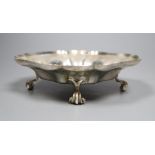 A George VI cusped silver bowl, on four scroll feet, with engraved inscription, Thomas Bradbury &