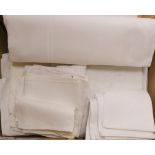 A quantity of white damask and embroidered table linen