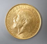 A George V 1913 gold sovereign.