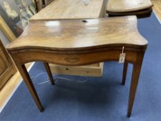 A George III mahogany and satinwood serpentine card table, width 88cm depth 44cm height 76cm