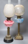 Two 19th century oil lamps, tallest 68cm including funnelCONDITION: Generally good; pink opaline