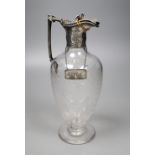 A Victorian silver mounted etched glass baluster claret jug, maker C.F. Sheffield, 1869, (lid a.f.),