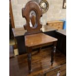 A Victorian mahogany hall chair